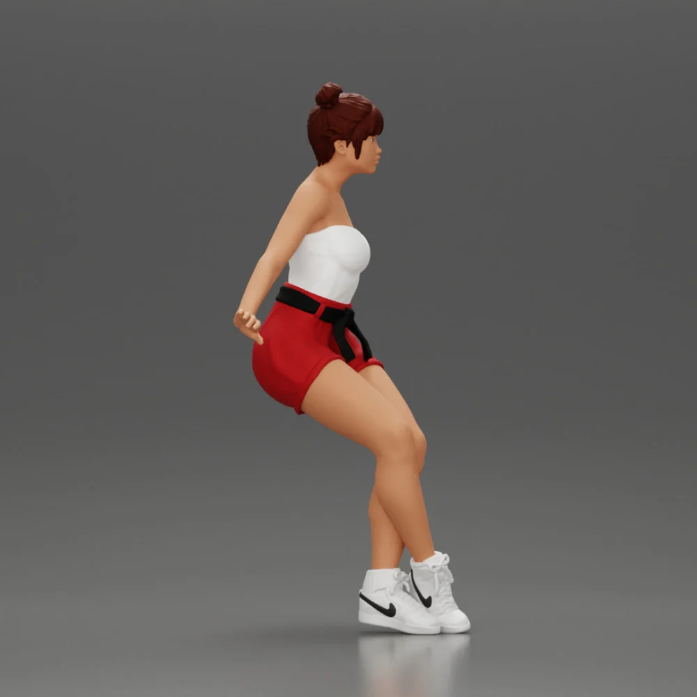 Asian girl wearing shorts sits on motorcycle - Image 2