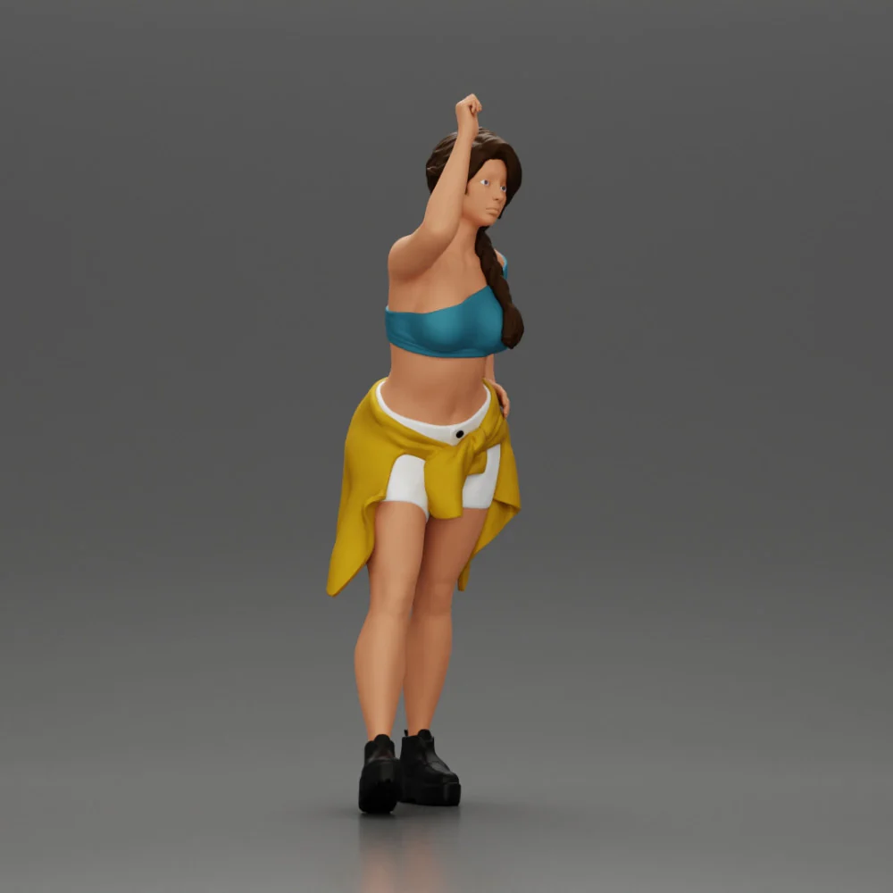 Fashionable Girl Wearing a Bra and shorts with Shirt Tied Around Her Hips - Image 2