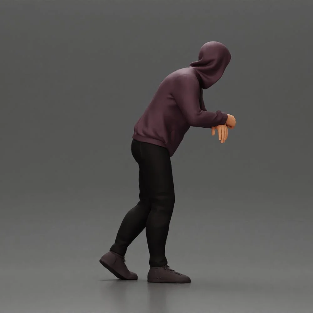 man in a hoodie leaning with his hands on the car - Image 5