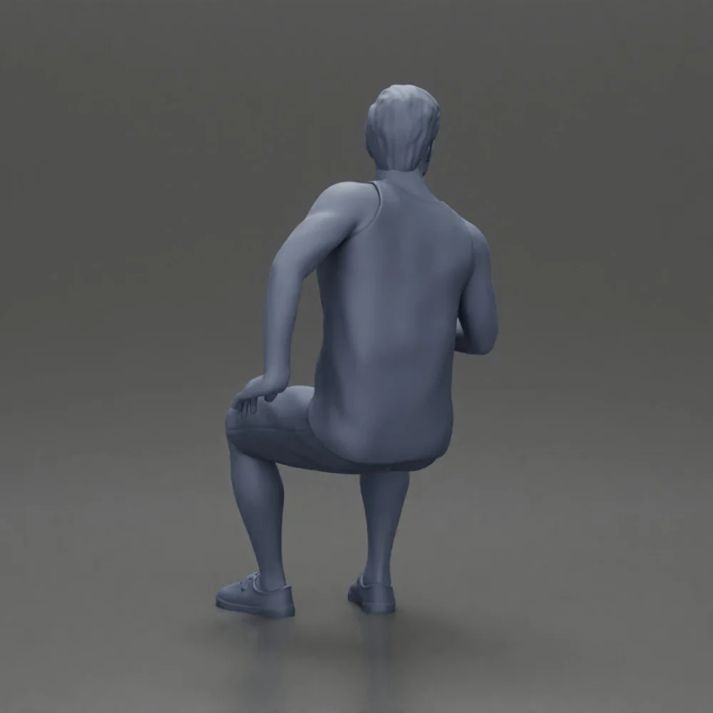 man sitting holding a can and wearing a tank top and shorts - Image 7