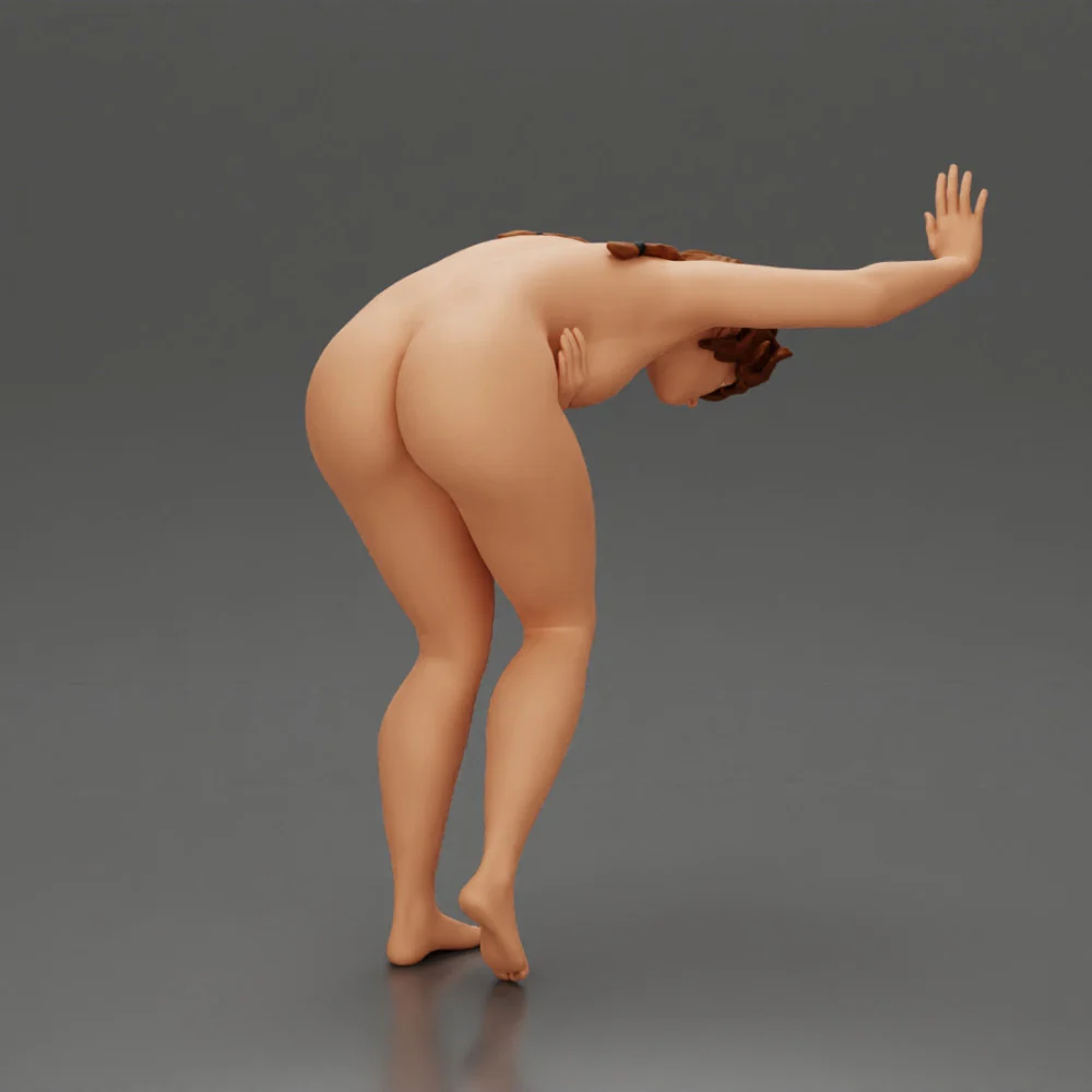 Naked girl holding her stomach and placing her hand on the wall due to stomach pain - Image 2