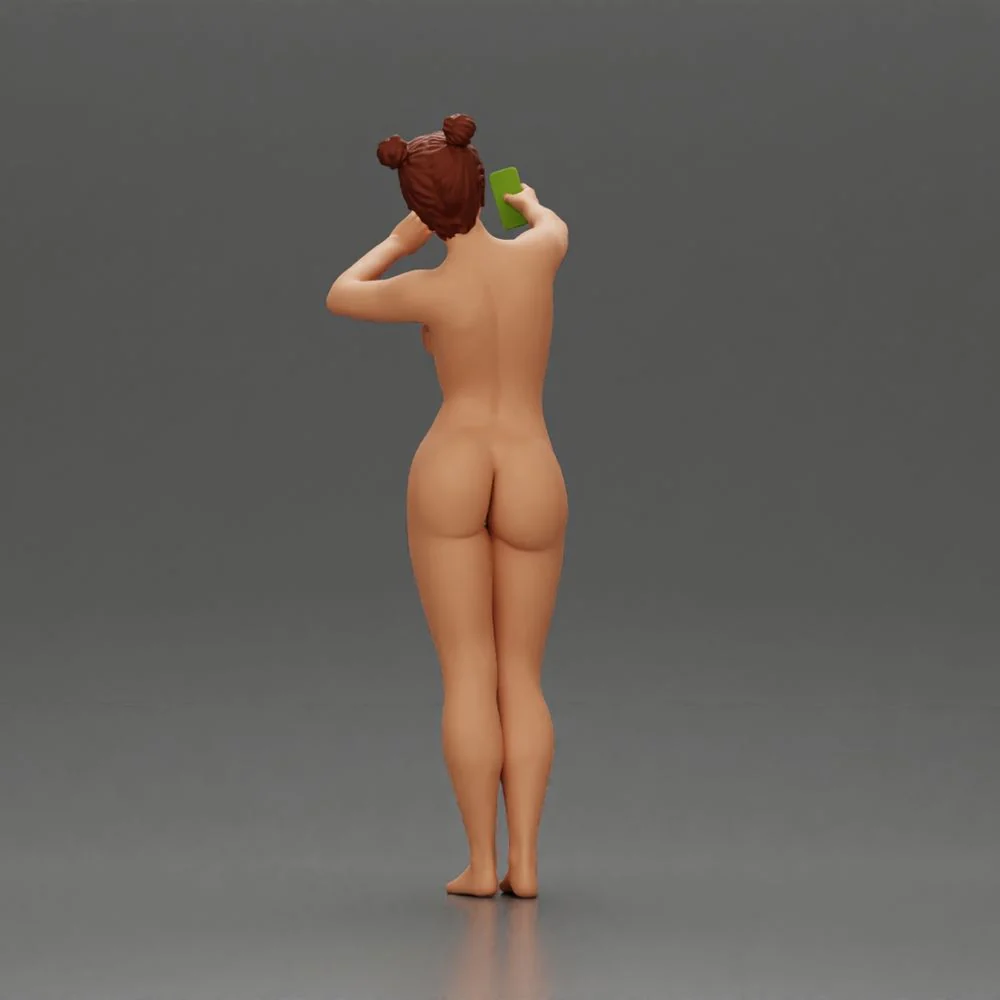 Naked woman taking a selfie with her phone on the beach - Image 4