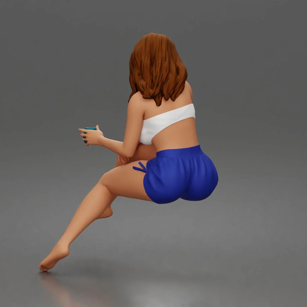 Relaxed woman sips morning coffee wearing summer top and shorts 1-24 - Image 4