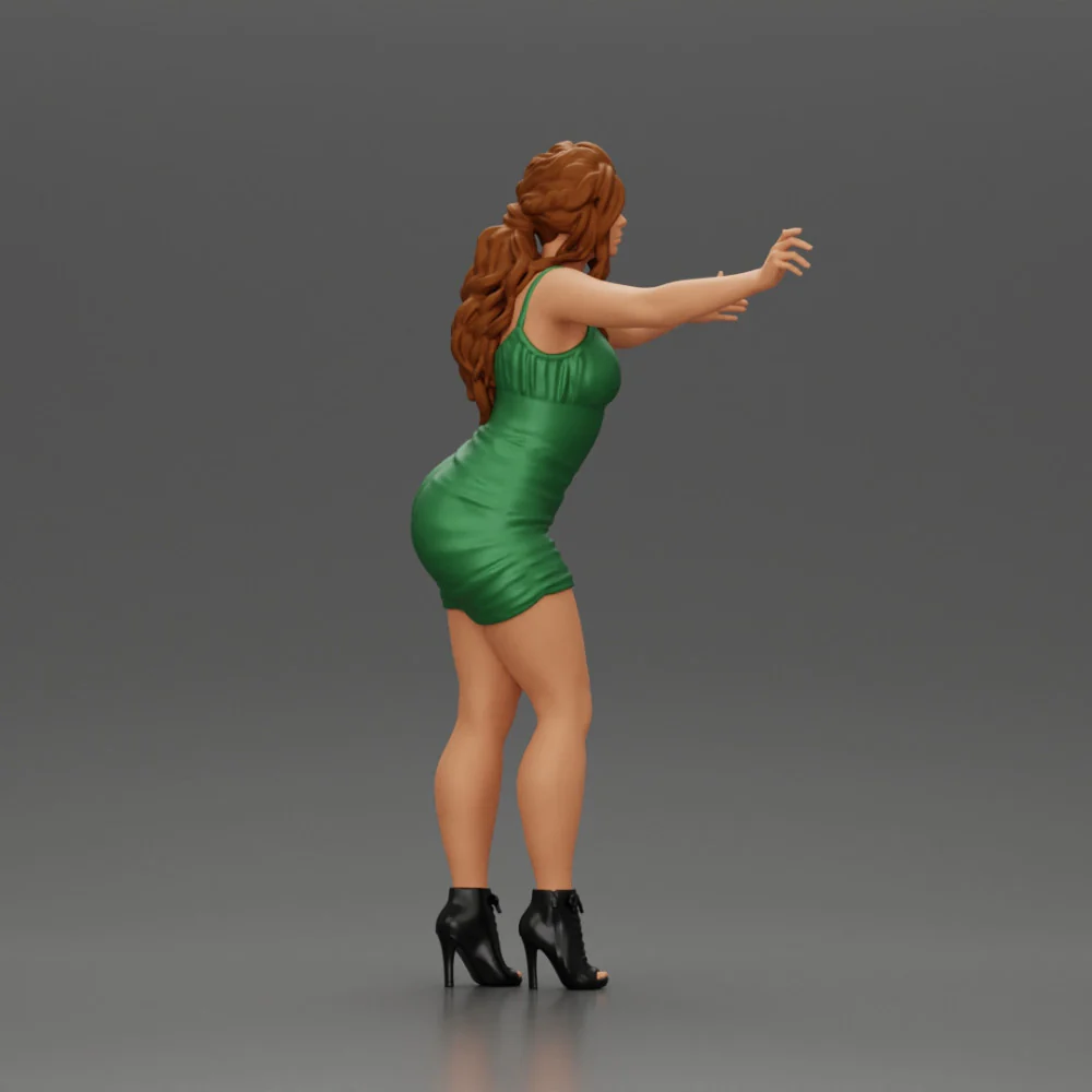 Sexy Girl in Dress and Heels Standing in Front of a Mirror - Image 3