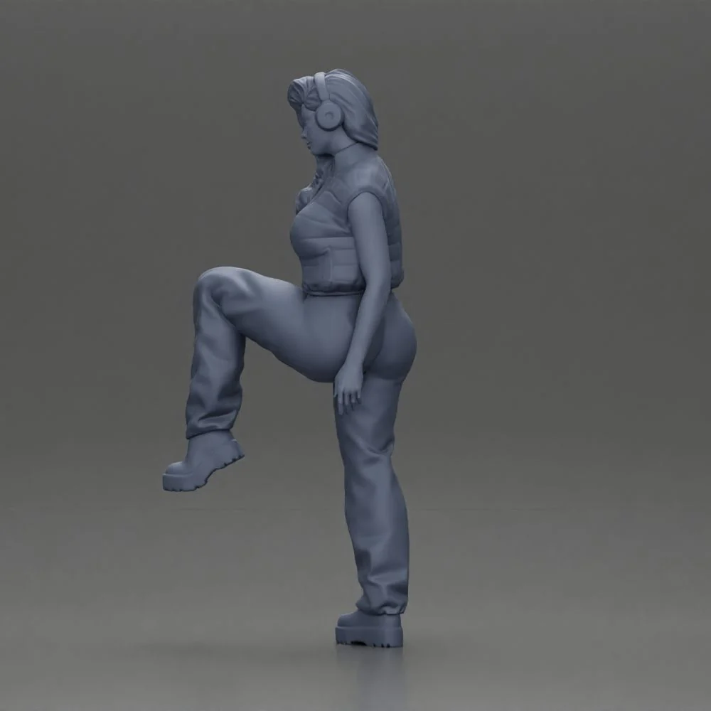 Woman in Headphones Lifting Leg in Stylish Streetwear - Image 10