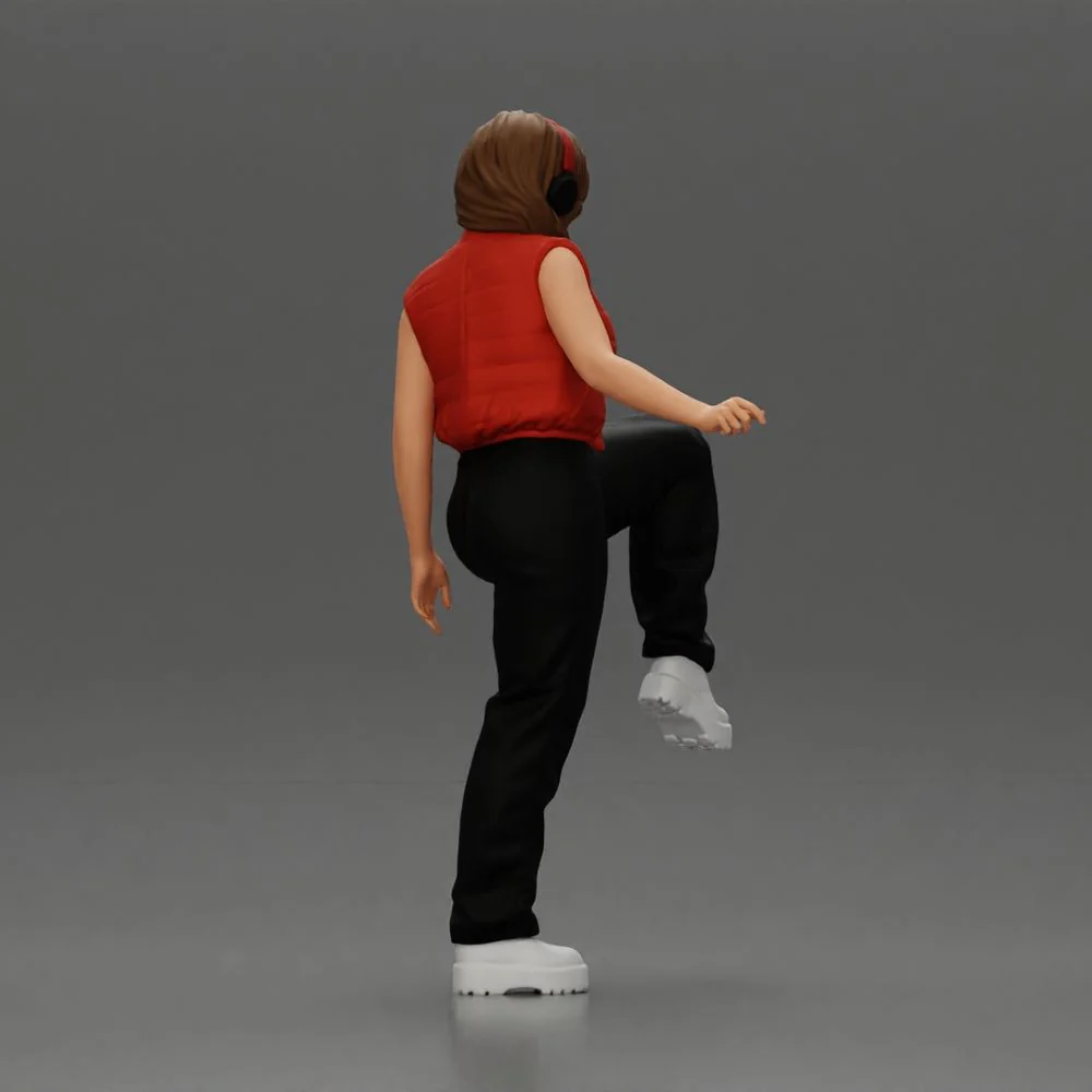 Woman in Headphones Lifting Leg in Stylish Streetwear - Image 6